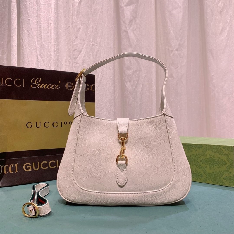 G*u*i top handle bags